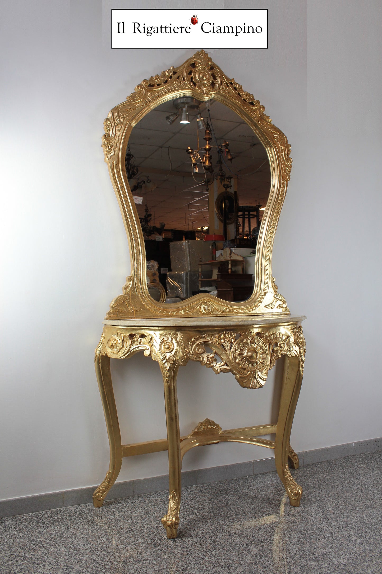 Consolle barocca in foglia oro con marmo champagne