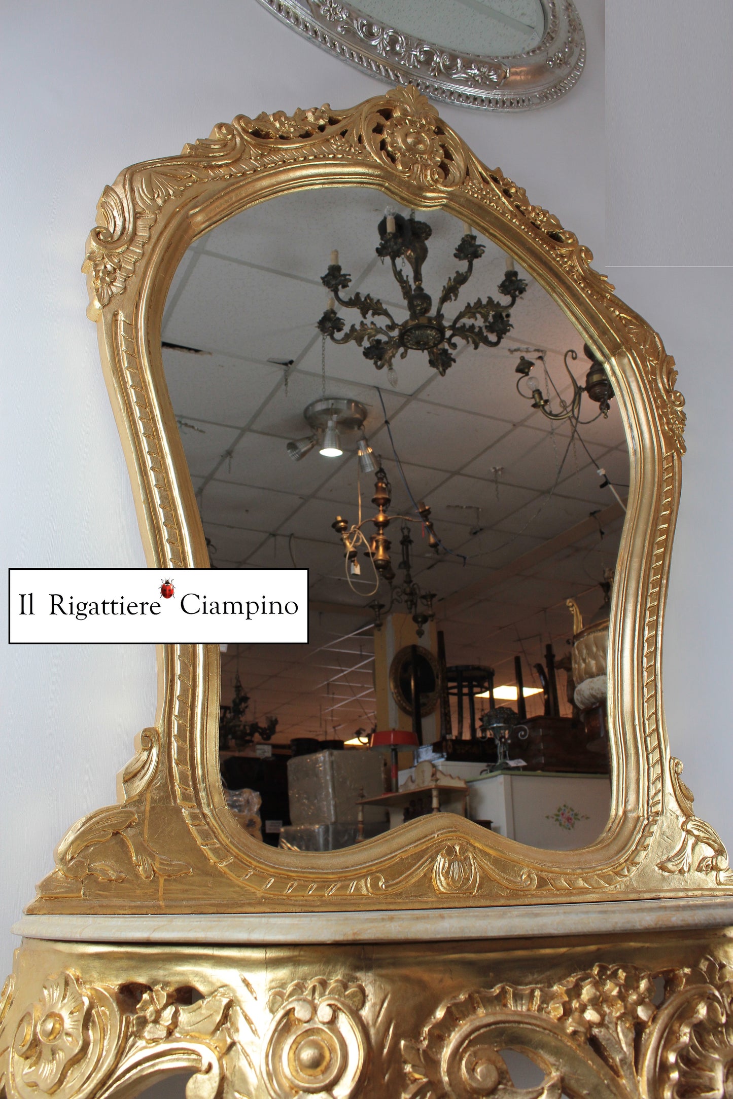 Consolle barocca in foglia oro con marmo champagne