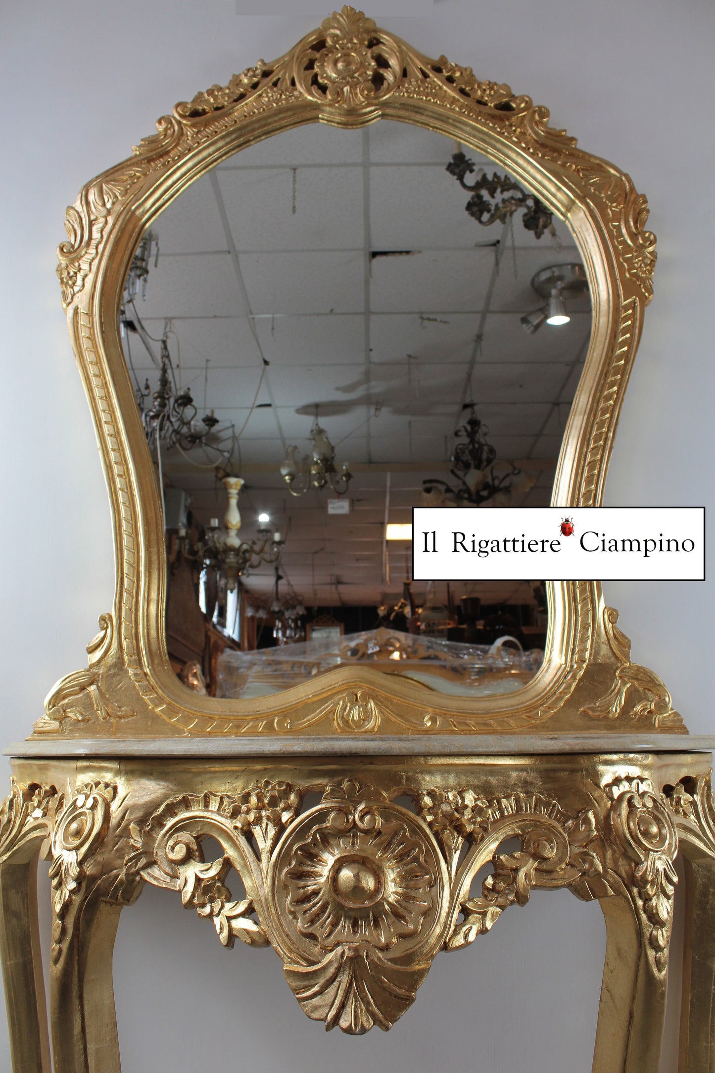 Consolle barocca in foglia oro con marmo champagne