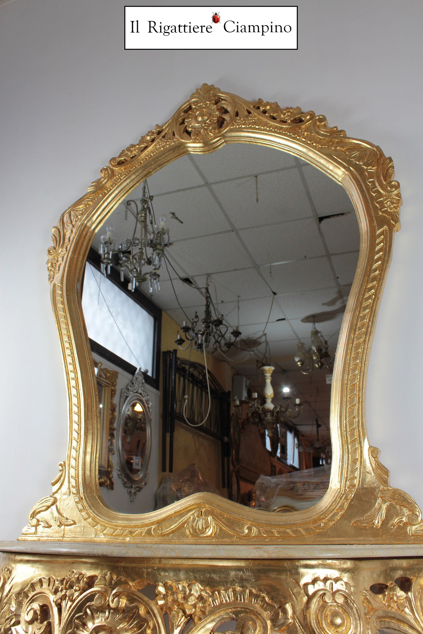 Consolle barocca in foglia oro con marmo champagne
