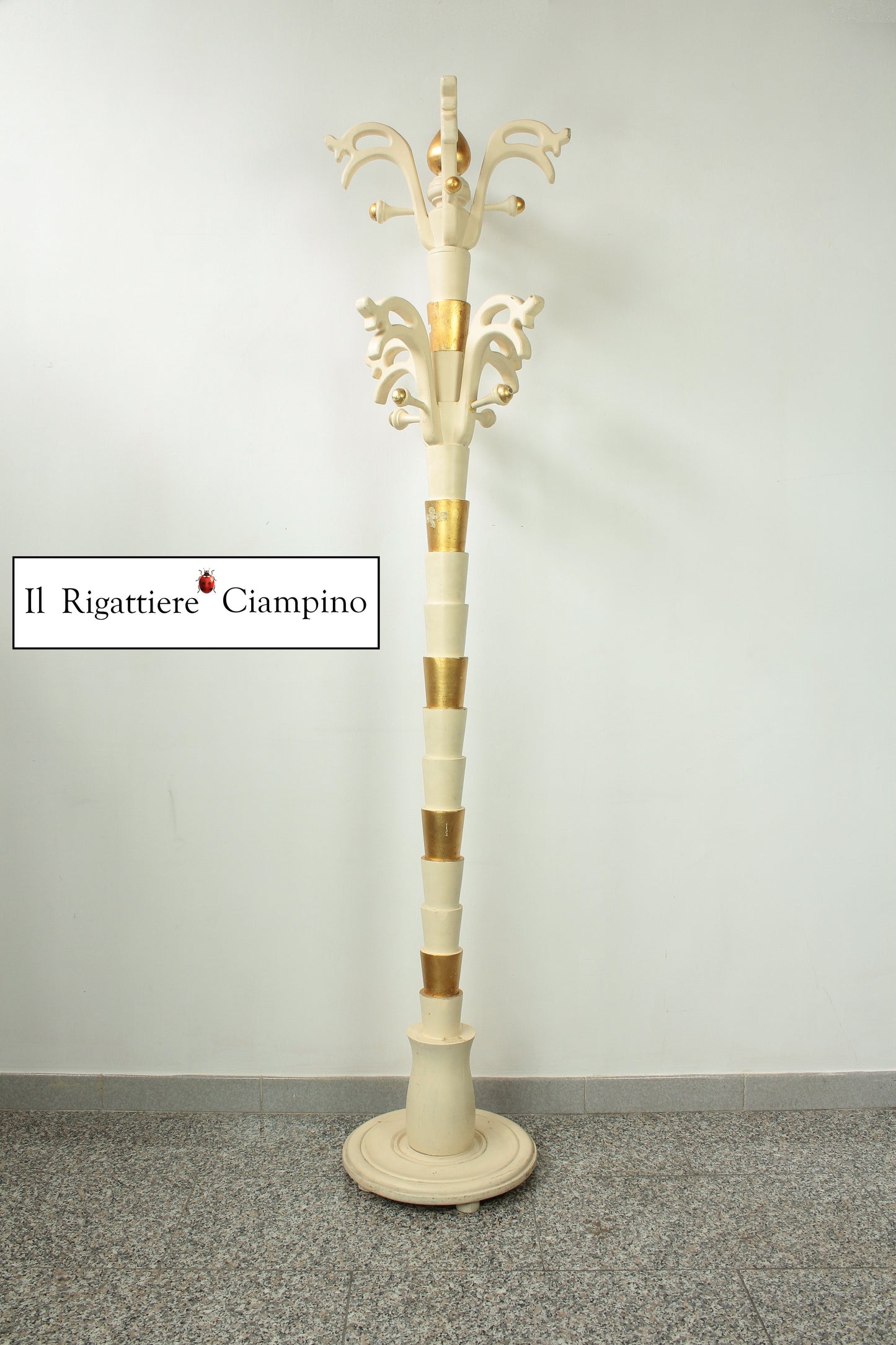 Appendiabiti crema con dettagli oro