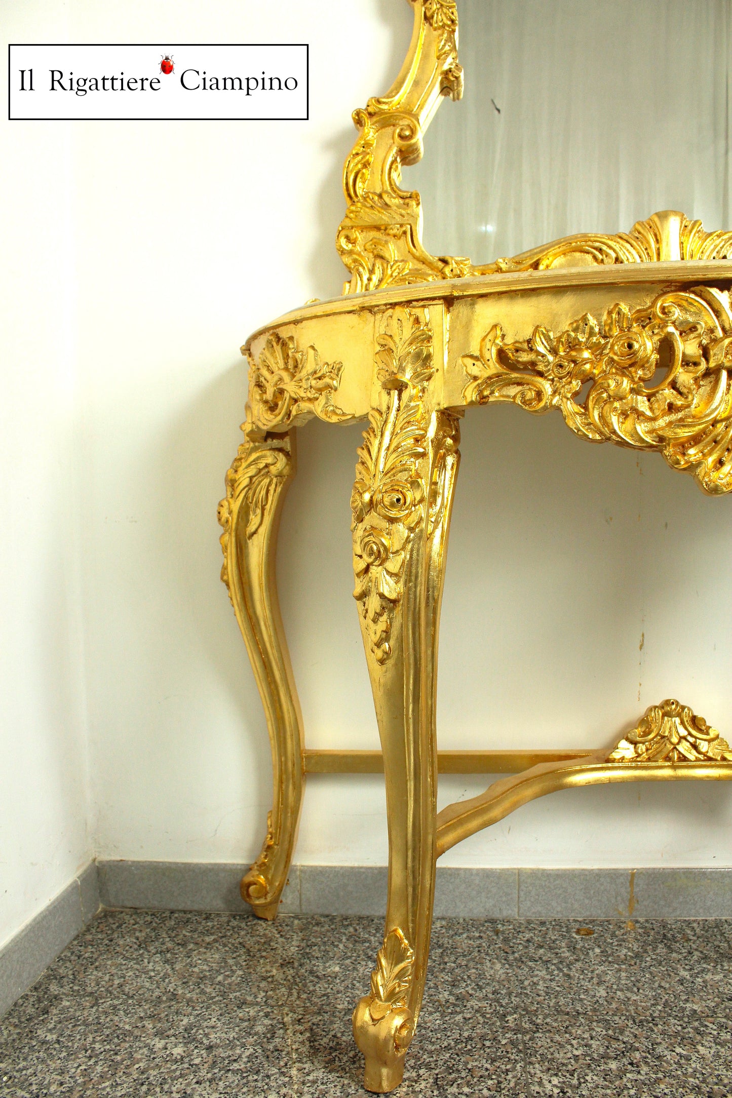 Consolle barocca in foglia oro con piano incastonato in marmo