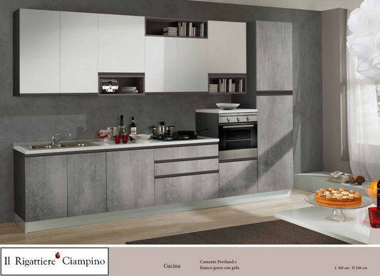 Arredo cucina con elettrodomestici di colore grigio cemento e bianco